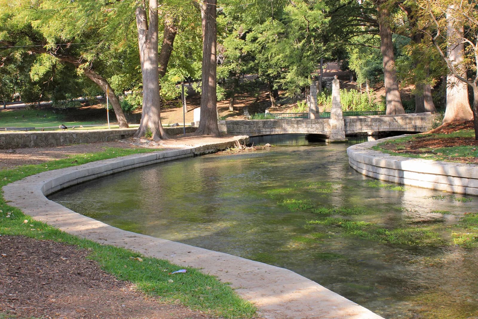 The Comal River and a bridge in Landa Park, New Braunfels